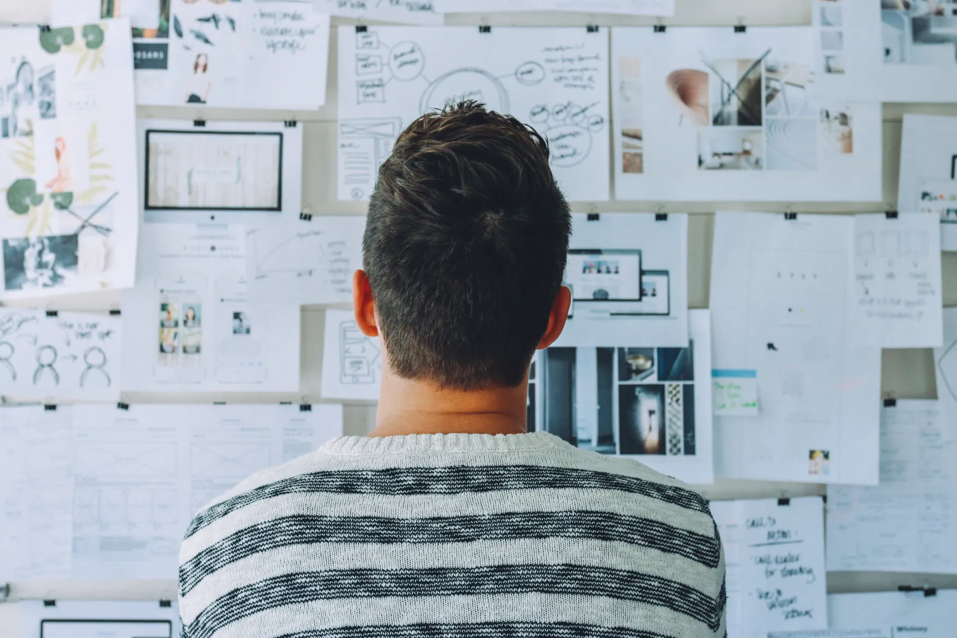 A group of workers discuss business processes in the office